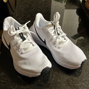 Nike Revolution running shoes DJ6009-100.super material fabric, rubber sole.